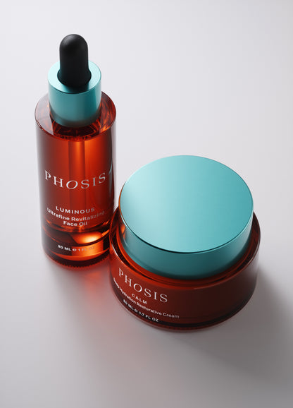 Two skincare products from the brand Phosis on a light gray background